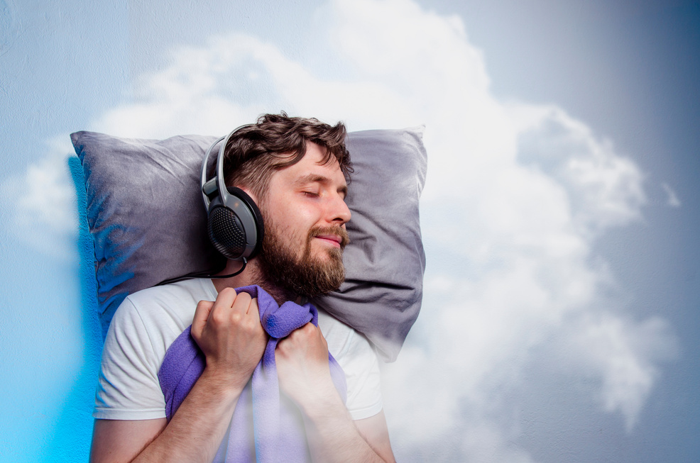 Man sleeping with headphones